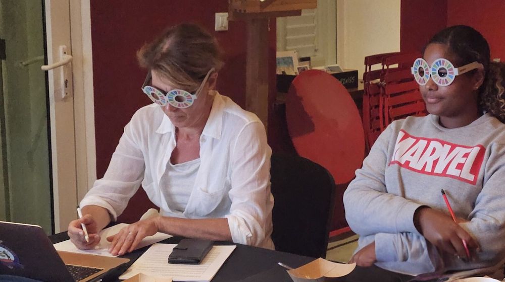 Staff members in Global Goals Glasses using the OCM Self-assessment Tool. Courtesy of the Terramar Museum.